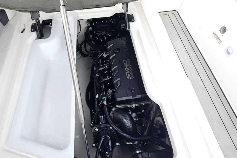 Slide: The Image of 2023 Yamaha Boats 275SDX engine compartment showcasing SVHO engine components. - 35