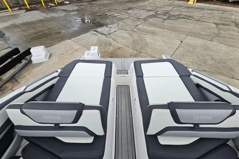 Slide: The Image of 2023 Yamaha Boats 275SDX interior seating, featuring sleek design and comfortable upholstery. - 37