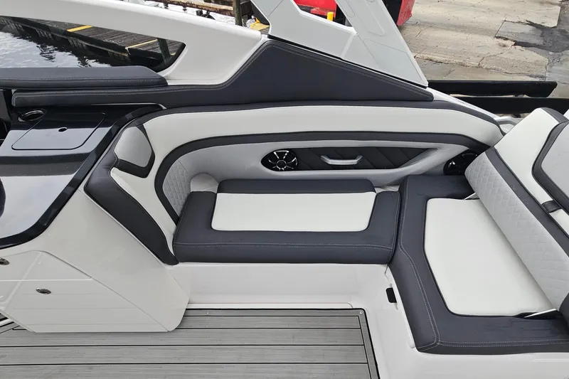 Slide: The Image of 2023 Yamaha Boats 275SDX interior with sleek seating and modern design. - 39