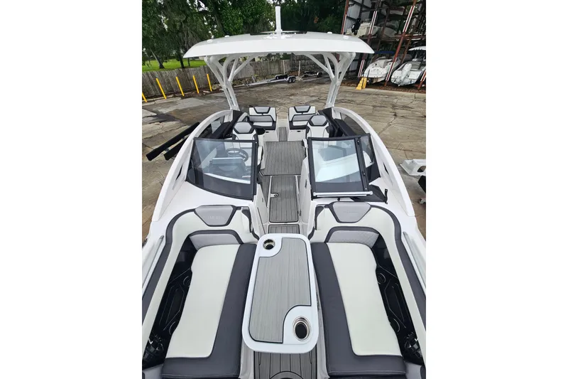 Slide: The Image of 2023 Yamaha Boats 275SDX interior with sleek seating and modern design. - 40