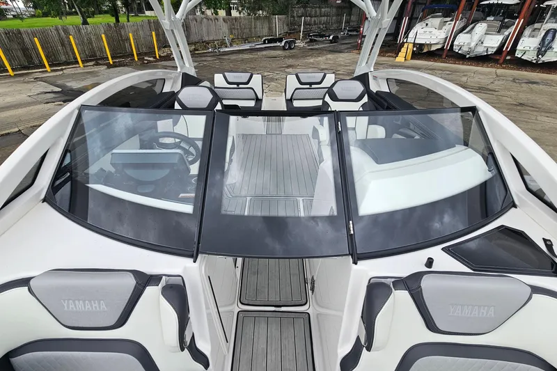 Slide: The Image of 2023 Yamaha Boats 275SDX interior with sleek design and comfortable seating. - 41