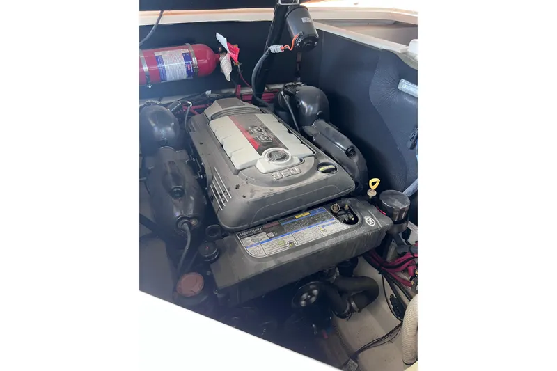 Slide: The Image of Engine compartment of a 2018 Sea Ray SLX 250 boat. - 26
