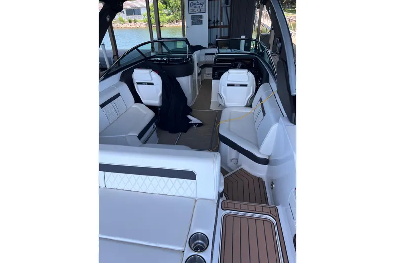 Slide: The Image of 2018 Sea Ray SLX 250 boat interior with luxurious seating and modern design. - 6