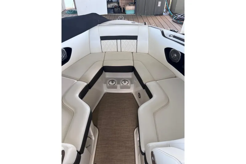 Slide: The Image of 2018 Sea Ray SLX 250 boat interior with luxurious seating and modern design. - 9