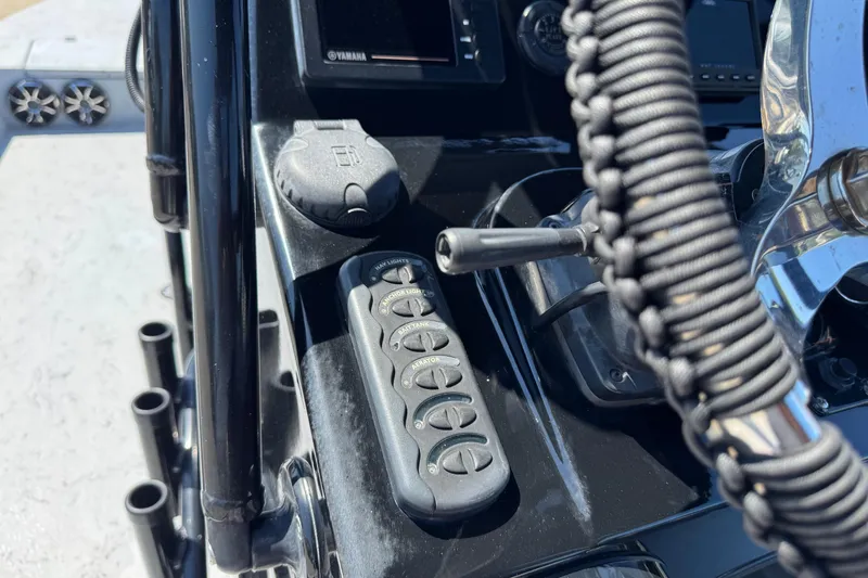 Slide: The Image of Control panel of a 2016 El Pescador 24 CAT boat with Yamaha electronics. - 23