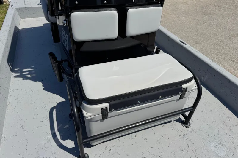 Slide: The Image of El Pescador 24 CAT 2016 boat seat with storage on deck. - 28