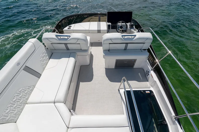 Slide: The Image of Manufacturer Provided Image: 2026 Regal 38 Fly yacht with luxurious white seating on open water. - 7