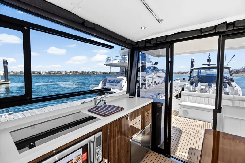 Slide: The Image of Interior of 2025 MJM 42 yacht featuring modern kitchen. - 16
