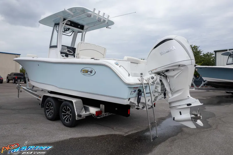 Slide: The Image of 2026 Sea Hunt Ultra 235 SE boat on trailer with Yamaha outboard motor. - 14