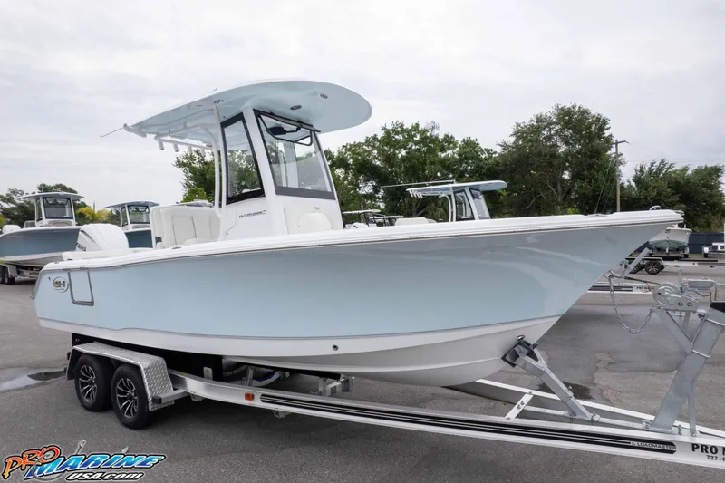 The Image of 2026 Sea Hunt Ultra 235 SE boat on trailer, displayed outdoors. - 2