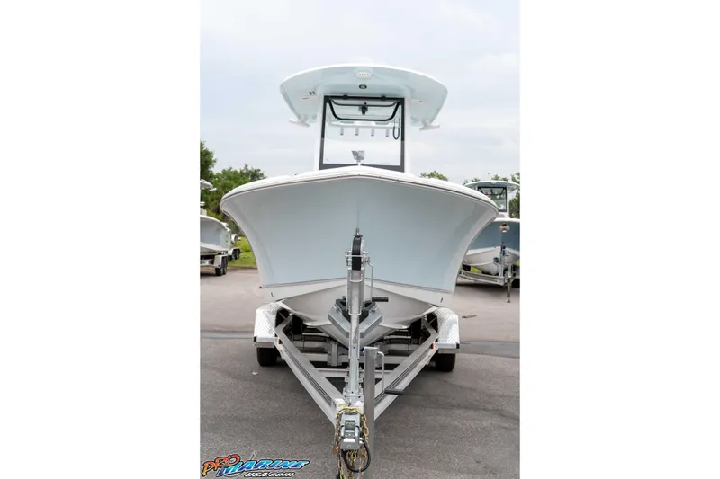 Slide: The Image of 2026 Sea Hunt Ultra 235 SE boat on trailer, front view. - 28