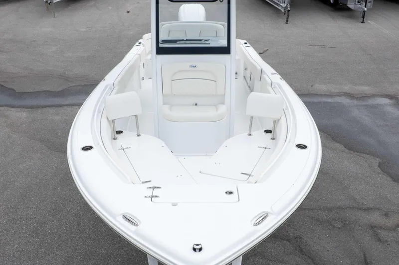 Slide: The Image of 2026 Sea Hunt Ultra 235 SE boat, showcasing spacious seating and sleek design. - 7