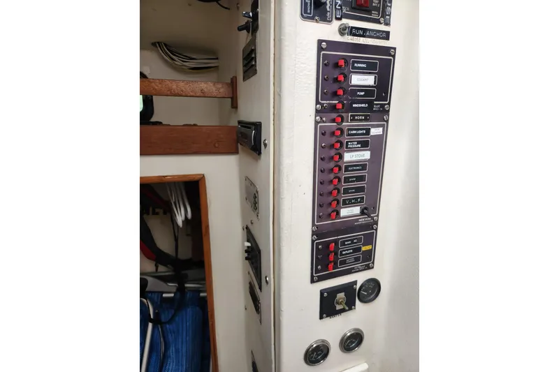 Slide: The Image of Electrical panel of a 1988 Duffy 31 Lobster Boat with labeled switches and controls. - 15