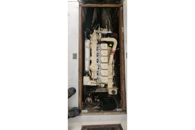 Slide: The Image of Engine compartment of a 1988 Duffy 31 Lobster Boat, showcasing detailed machinery. - 18
