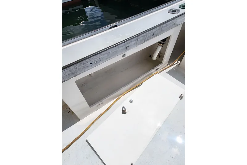 Slide: The Image of Open storage compartment on 1988 Duffy 31 Lobster Boat deck. - 20