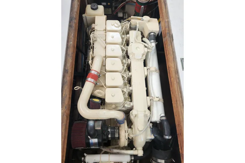 Slide: The Image of Engine of a 1988 Duffy 31 Lobster Boat, showcasing detailed components and layout. - 21