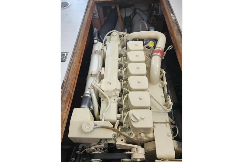 Slide: The Image of Engine of a 1988 Duffy 31 Lobster Boat, showcasing detailed components. - 23