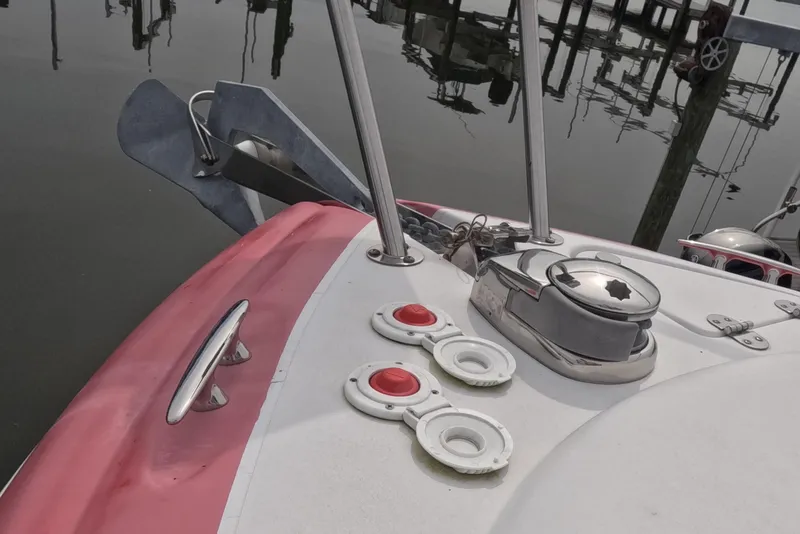 Slide: The Image of 2012 Four Winns V265 boat deck with anchor and chrome fittings. - 13