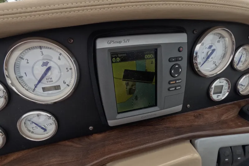 Slide: The Image of Dashboard of 2012 Four Winns V265 boat with Garmin GPS and gauges. - 38