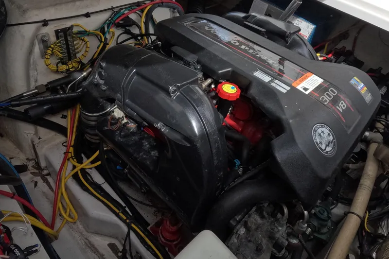 Slide: The Image of Engine compartment of 2012 Four Winns V265 boat with Volvo Penta 300 V8 engine. - 76