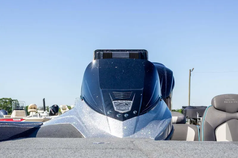 Slide: The Image of 2018 Skeeter ZX250 boat, front view, with sleek design and visible seating. - 17