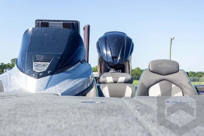 Slide: The Image of 2018 Skeeter ZX250 boat with Yamaha engine, featuring sleek design and comfortable seating. - 18