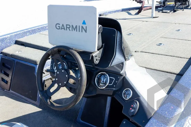 Slide: The Image of 2018 Skeeter ZX250 boat dashboard with Garmin navigation system. - 19