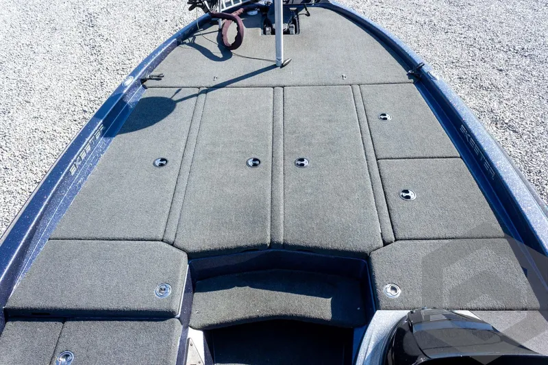 Slide: The Image of 2018 Skeeter ZX250 boat deck with carpeted storage compartments. - 21