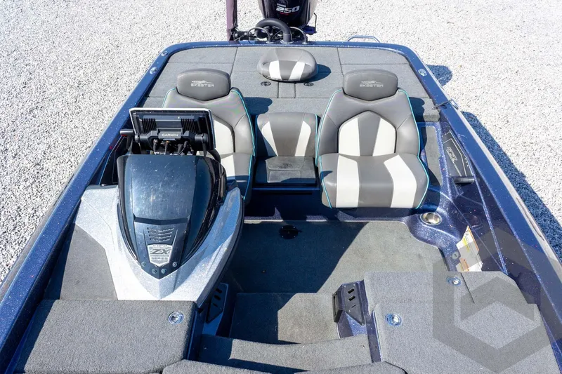 Slide: The Image of 2018 Skeeter ZX250 boat interior with Garmin electronics and dual seating. - 27