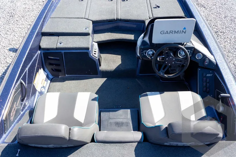 Slide: The Image of 2018 Skeeter ZX250 boat interior with Garmin navigation system and dual seats. - 28