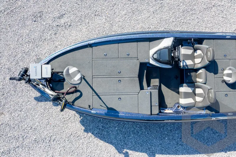 Slide: The Image of Overhead view of 2018 Skeeter ZX250 boat on gravel surface. - 38