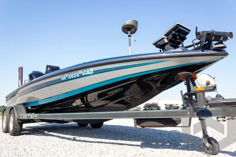 Slide: The Image of 2018 Skeeter ZX250 boat on trailer, featuring sleek design and modern equipment. - 4