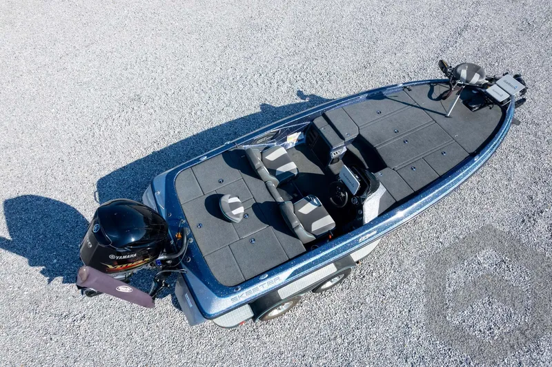 Slide: The Image of 2018 Skeeter ZX250 fishing boat with Yamaha engine on gravel surface. - 44