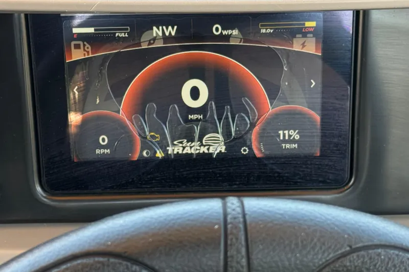 Slide: The Image of Dashboard display of 2024 Sun Tracker SportFish 22 DLX showing speed, RPM, and trim. - 31