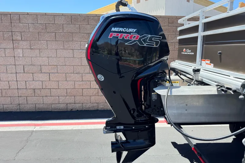 Slide: The Image of 2024 Sun Tracker SportFish 22 DLX with Mercury Pro XS outboard motor. - 7