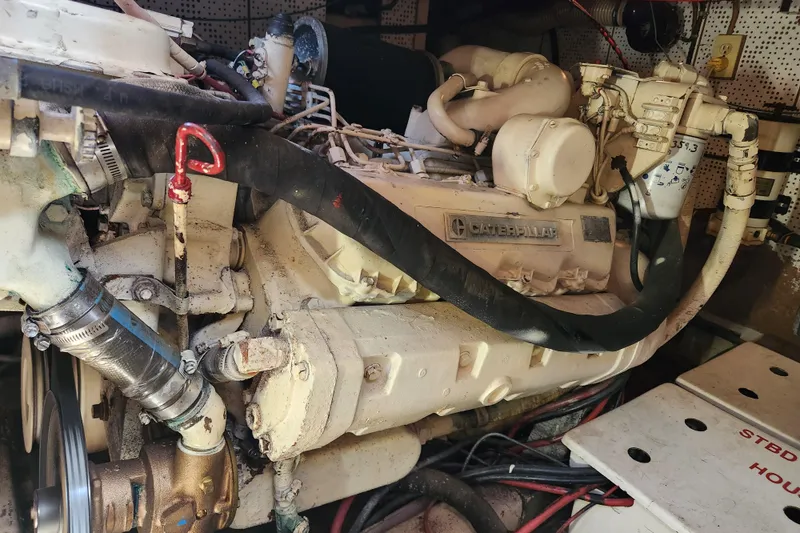 Slide: The Image of Engine room of a 1987 Jefferson 42 SE Sundeck Motor Yacht with Caterpillar engine. - 48