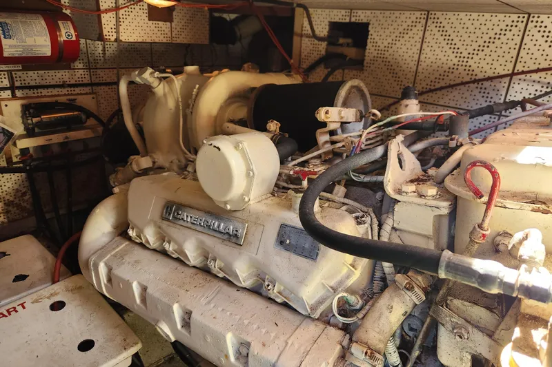 Slide: The Image of Engine room of 1987 Jefferson 42 SE Sundeck Motor Yacht with Caterpillar engine. - 51