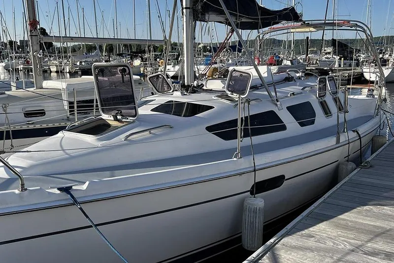 Slide: The Image of Sailboat docked in marina, 2001 Marlow-Hunter 320, white hull, sunny day. - 7