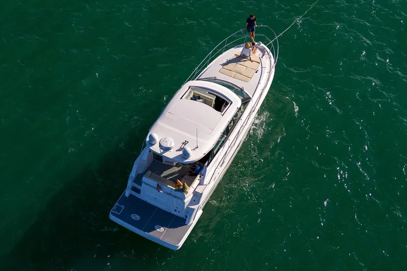 Slide: The Image of Manufacturer Provided Image: 2026 Regal 38 Grande Coupe cruising on open water, aerial view. - 5