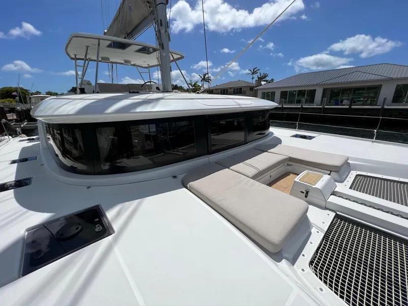Slide: The Image of 2022 Lagoon 46 catamaran with sun deck and modern design. - 14