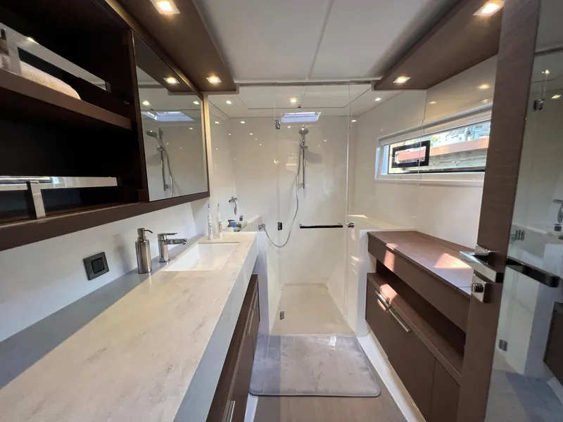 Slide: The Image of Luxurious bathroom in 2022 Lagoon 46 yacht with modern fixtures. - 26