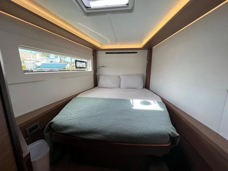 Slide: The Image of Interior of a 2022 Lagoon 46 yacht with cozy bedroom. - 27