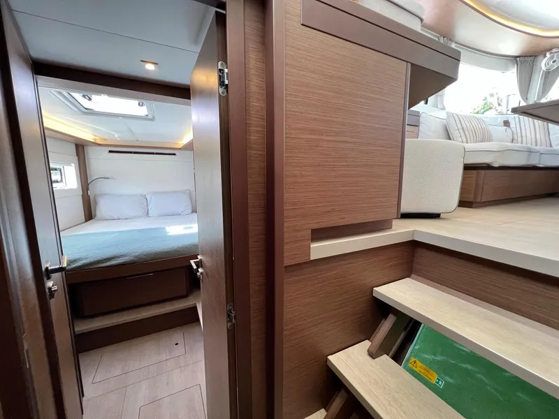 Slide: The Image of Interior of Lagoon 46 yacht, bedroom and stairs, year 2022. - 29