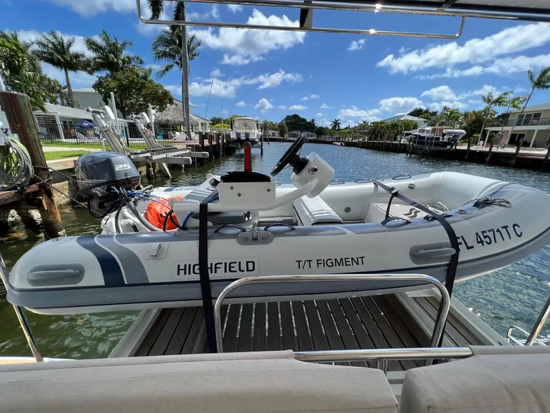 Slide: The Image of Highfield tender on Lagoon 46 catamaran, 2022 model, in sunny marina. - 3