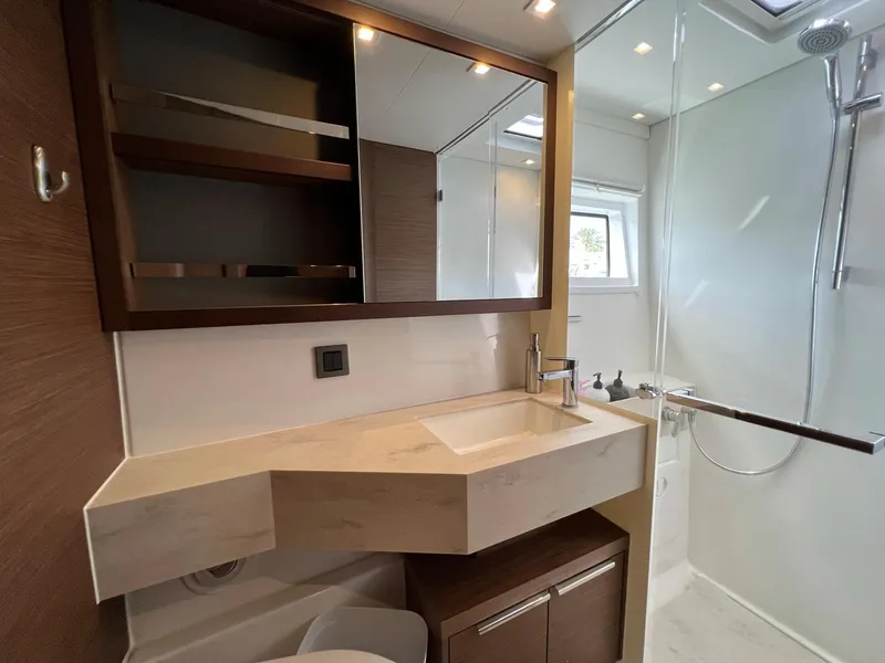 Slide: The Image of Luxurious bathroom on Lagoon 46 catamaran, model year 2022. - 31