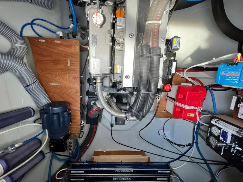 Slide: The Image of Engine room of 2022 Lagoon 46 yacht with technical components. - 35