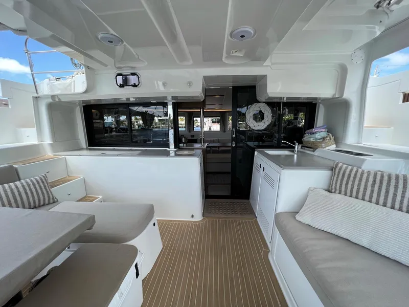 Slide: The Image of Interior of a 2022 Lagoon 46 yacht with modern seating. - 5