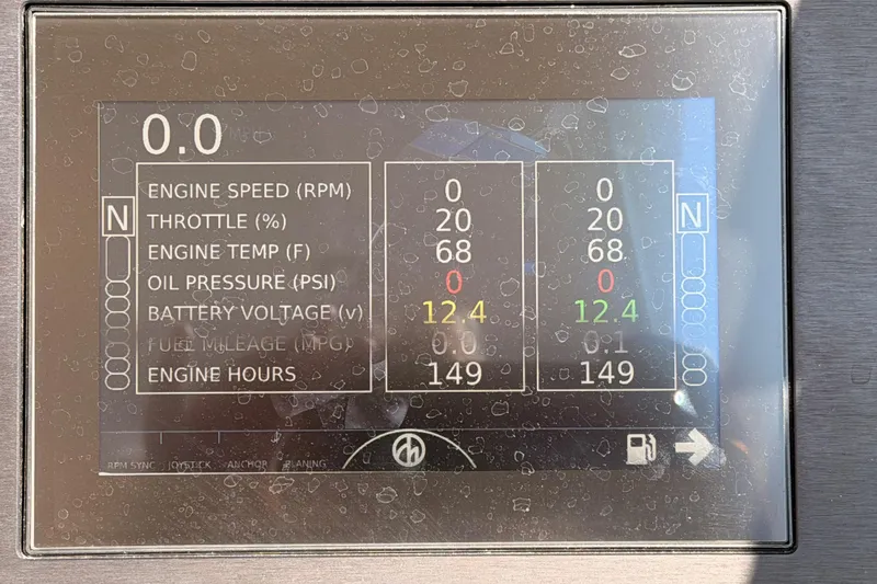 Slide: The Image of Display panel of 2022 Aviara AV32 I/O showing engine metrics and performance data. - 53