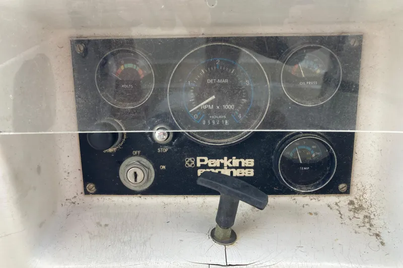 Slide: The Image of Control panel of a 1988 Cape Dory 36 sailboat with Perkins engine gauges. - 27