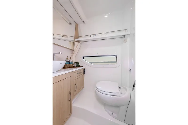 Slide: The Image of Manufacturer Provided Image: Luxurious bathroom in 2026 Regal 33 Express yacht with modern fixtures and elegant design. - 10